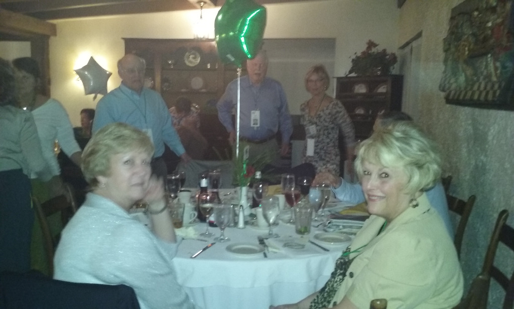 Judy (Shumaker) Devey & Lorraine at banquet table